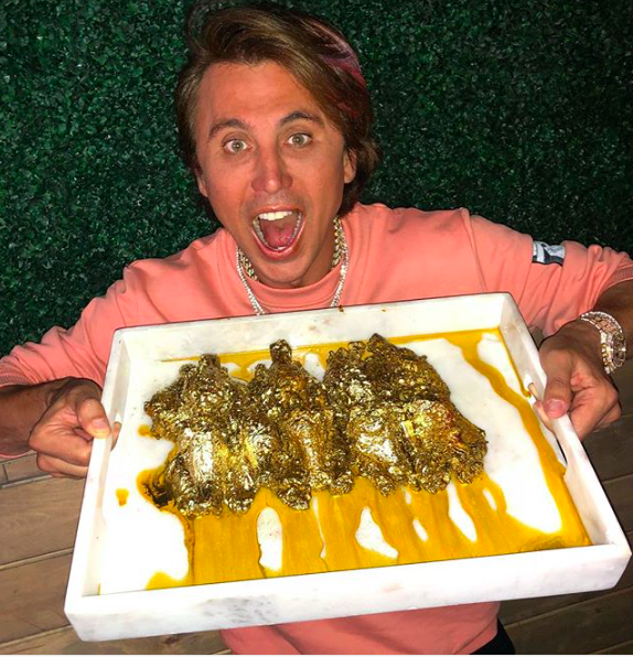 foodgod with his gold-covered chicken wings